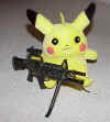 Pikachu and M16.jpg (28235 bytes)